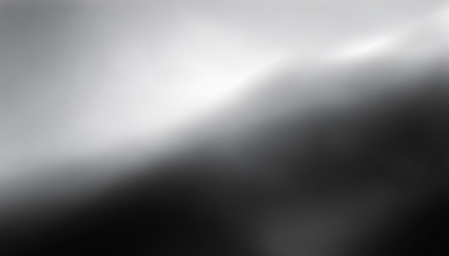 Silver and charcoal gradient with sleek metallic sheen suggesting automotive and industrial elegance