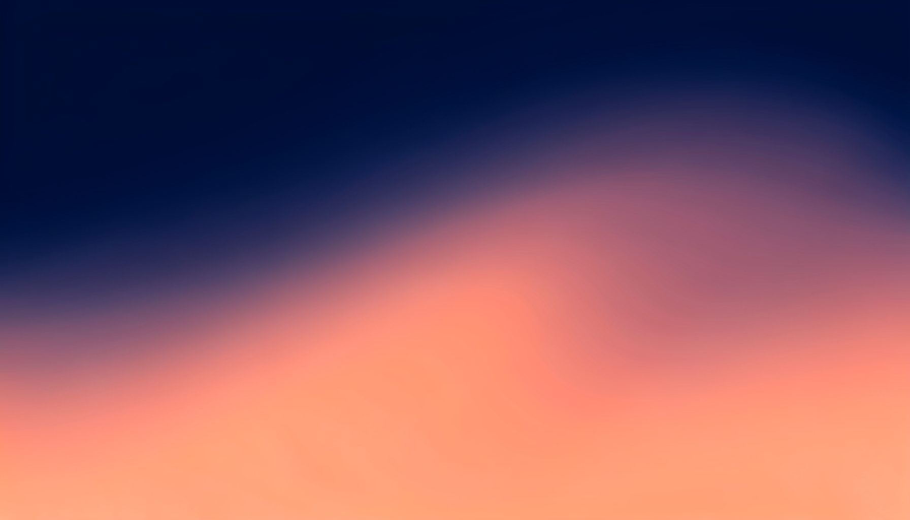 Soft abstract gradient background blending deep navy blue with warm coral orange tones, smooth and calm